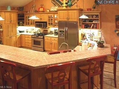 Roomy and efficient kitchen with custom cabinets, 