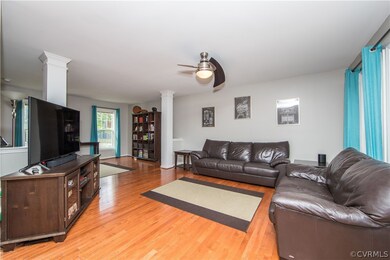 Family Room.  Notice the lovely hardwood floors.