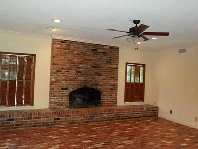 Living Room. Large wood burning fireplace with com