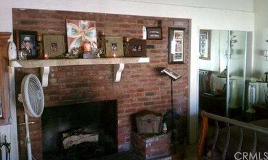 Gorgeous brick fireplace in one of the bedrooms.