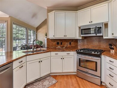 Elegant Rain Forest Marble countertops and backspl