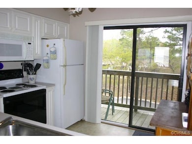 KITCHEN WITH DECK OVERLOOKING THE MARINA
