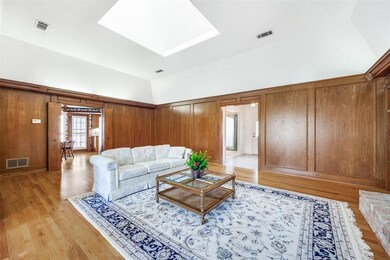 Living room featuring light hardwood / wood-style 