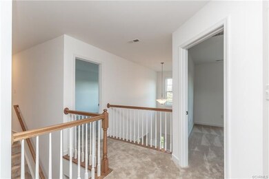Elegant hallway to secondary bedrooms.