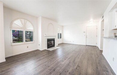 New Wood Laminate Flooring & Gas Fireplace