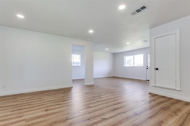 Unfurnished room with recessed lighting, visible v