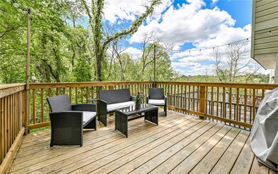 Private Rear Deck surrounded by trees