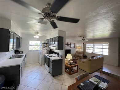 Partial views of Family room and kitchen - Unit 2.
