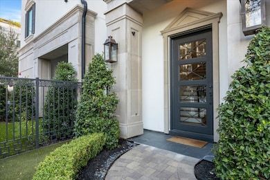 Gas lanterns flank the front door.