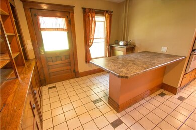 Another view of the kitchen showing the butler's p