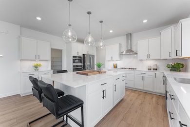 (Photo of a similar home, actual homes finished will vary) Another view of the gourmet kitchen.