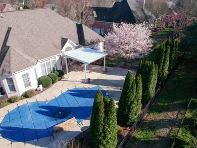 This relaxing backyard is home to a 15x30 built-in pool.  Winter cover included!