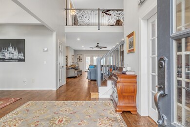 Front entry with soaring ceilings. GRAND ENTRANCE