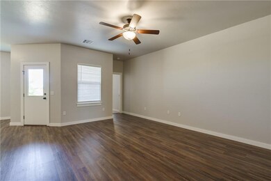 Door to patio and entry to master.