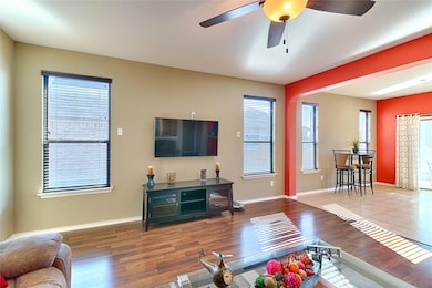 Living area with wood finished floors, plenty of 