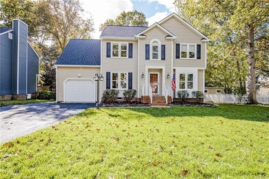 Beautifully landscaped, this four bedroom, two and