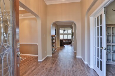 Gorgeous Foyer with wood-look, porcelain tile floo