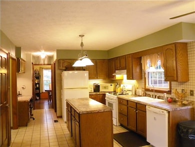 Kitchen features a large pantry and large island w