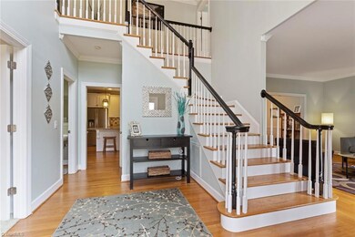 Impressive two story foyer.