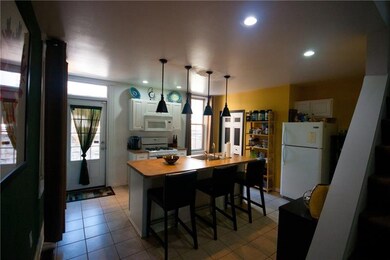 Fully updated kitchen with stove and refrigerator 
