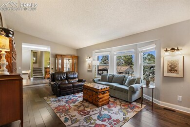 Living room and entry. Beautiful Bay window!