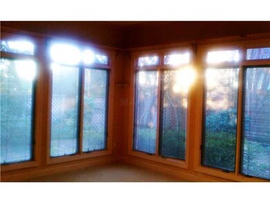 THIS DEN/SUNROOM OPENS TO LARGE PATIO.