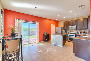 Kitchen with stainless steel appliances, a kitche
