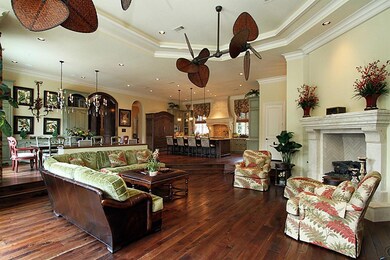 Hand laid, wide plank, reclaimed, hardwood floors are from Pennsylvania, and are gorgeous! Limestone fireplace matches the hood. Furniture by Wesley Hall, available as well.