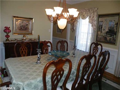 Dining Room - Formal dining room offers hardwood f