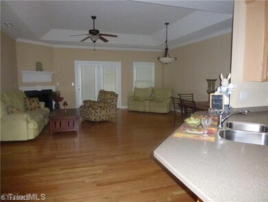 Den/Family/Great Room. The Great Room is spacious and very open with trey ceiling, gleaming hardwood floors and gas logs in the fireplace.
