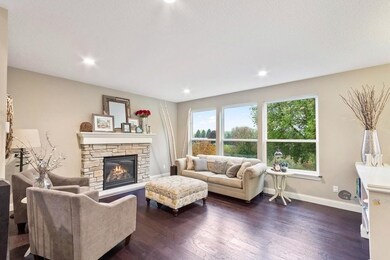 Lovely mantle and stone surround on the gas firepl