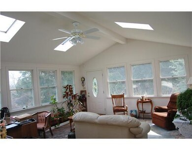 Sunroom. Incredible sunroom with bright decor and 