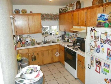 Nice sized kitchen has room for storage and cookin