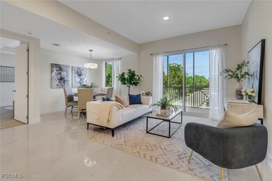 Living room featuring plenty of natural light, recessed lighting, and light tile patterned flooring