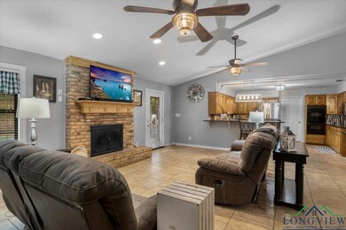 Living room featuring light tile patterned floors,