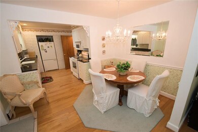 Dining Area With Hardwood Floors!