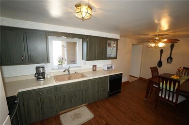 Owner wanted to open wall (to right of table/chair