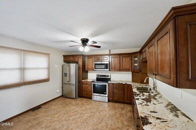 1419 9th Ave NE, Jamestown, ND 58401 - photo 2