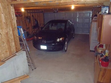 Attached oversized garage with great space, storag