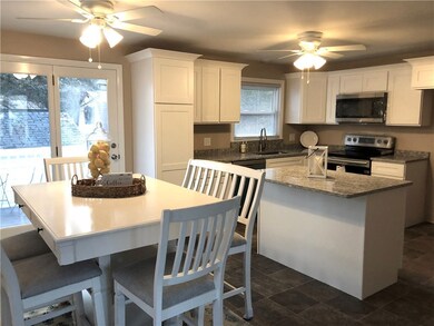 dining area of kitchen with french doors to deck