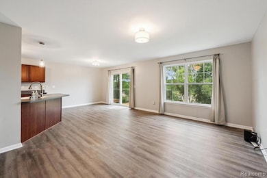 1400 Sqft 3 Bed 3.5 Bath Condo w/ Finished Walkout Basement and 2 Car Attached Garage ~ New Flooring & Fresh Paint