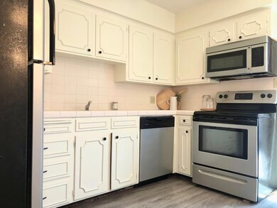 Repainted kitchen w/ new hardware