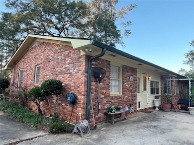 View of home's exterior with a patio