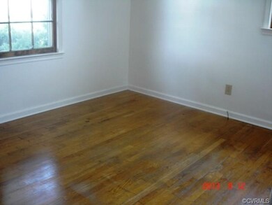All three bedrooms have hardwood floors & ceiling 