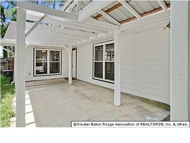 Large shady patio is great for entertaining. Home 