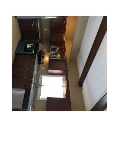 Kitchen. New Cherry Kitchen with Granite Counters