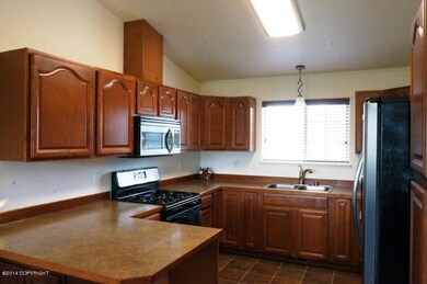 Kitchen With Cherry Cabinets