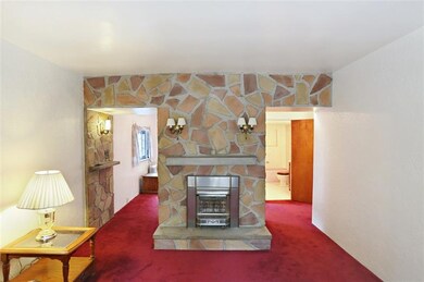 Bright front living/family room with Gas Fireplace