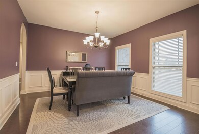 Formal Dining Room features hardwood flooring, designer paint selection, lots of natural lighting, and wainscoting! 3503 Salem Cove Lane Murfreesboro, TN 37128