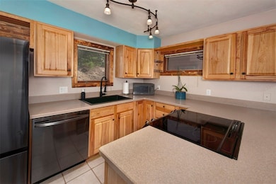 Kitchen with WiFi enabled appliances and updated c